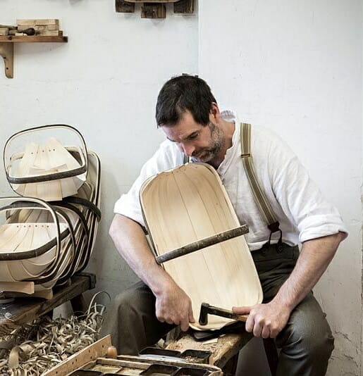 Charlie Groves making a traditional Sussex trug. Pinning each willow board in place with cut copper tacks.